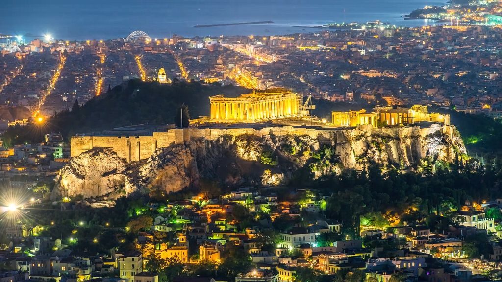 Athens at night with illuminated Acropolis