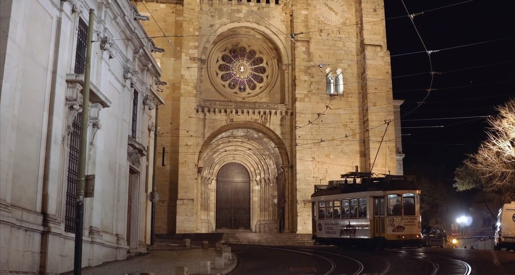 Famous landmarks of Lisbon including tram and cathedral
