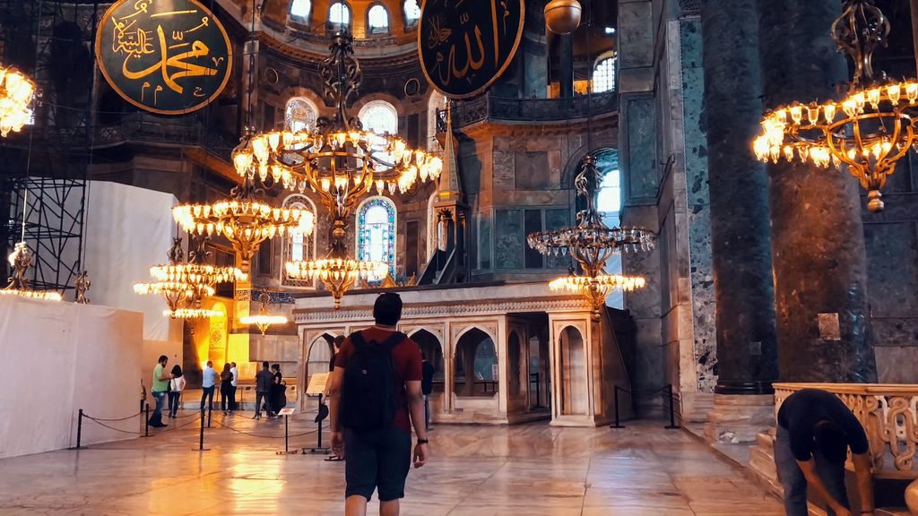 Interior of Hagia Sophia with grand dome and mosaics