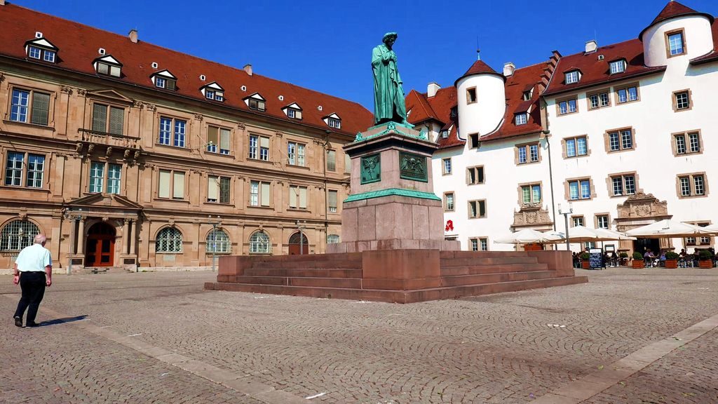 Schillerplatz square with Schiller monument and Stiftskirche church in Stuttgart, Germany