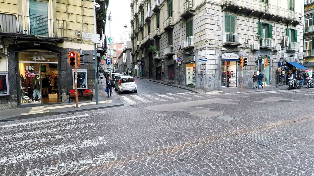 Vibrant narrow streets of Naples with historic buildings