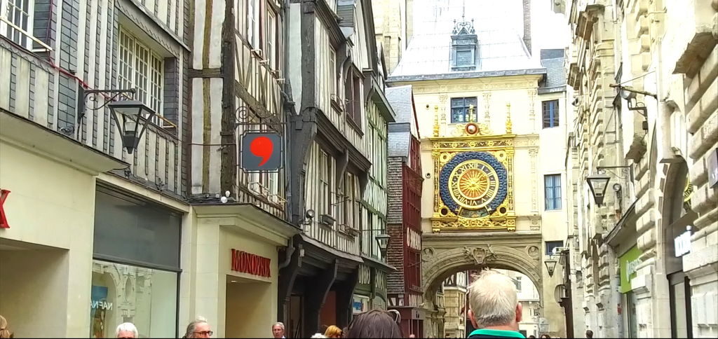 The Gros-Horloge, a medieval astronomical clock tower on a street in Rouen
