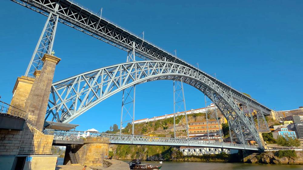 Dom Luís I iron bridge spanning the Douro River gorge in Porto