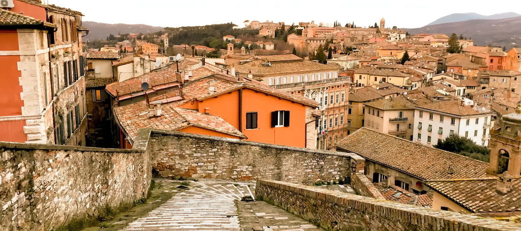 Aerial view of Perugia's historic center with rooftops and towers