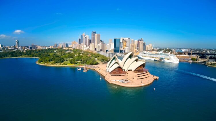 Iconic Sydney Opera House and Harbour Bridge at sunset
