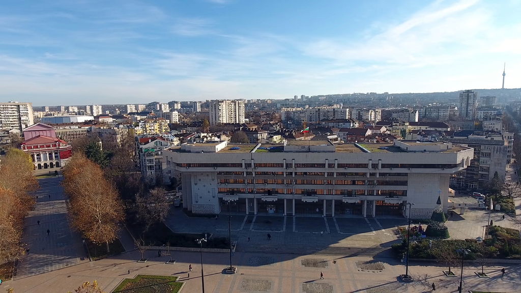 Panoramic view of Ruse, Bulgaria, showcasing Neo-Baroque architecture along the Danube River