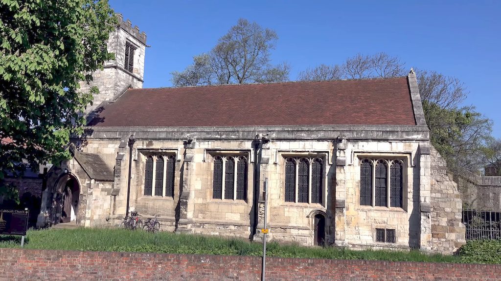Holy Trinity Church medieval architecture with peaceful churchyard