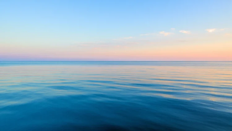 Beautiful view of the Atlantic Ocean with clear blue water and sky