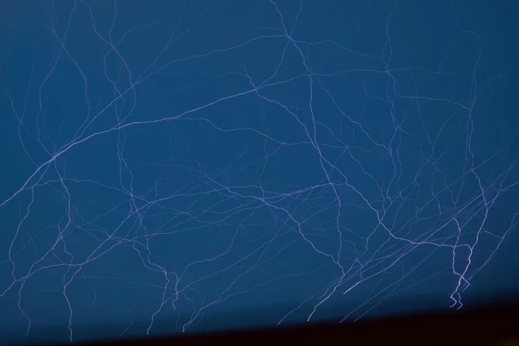St. Elmo's Fire electrical discharge on ship masts during storm