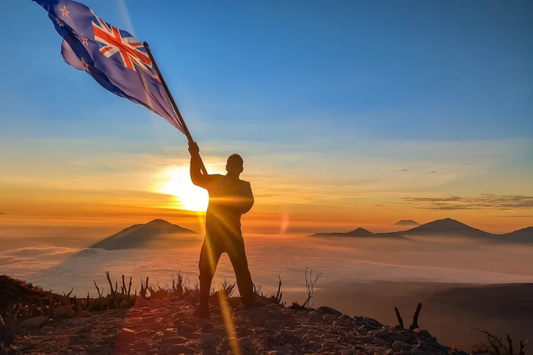 Modern Kiwi New Zealander with national flag symbolizing pride and unity